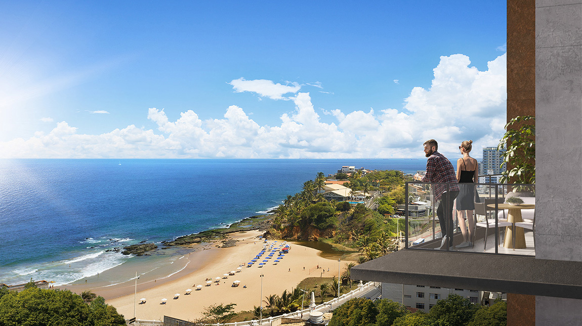 Perspectiva de casal na varanda do apartamento olhando para o mar